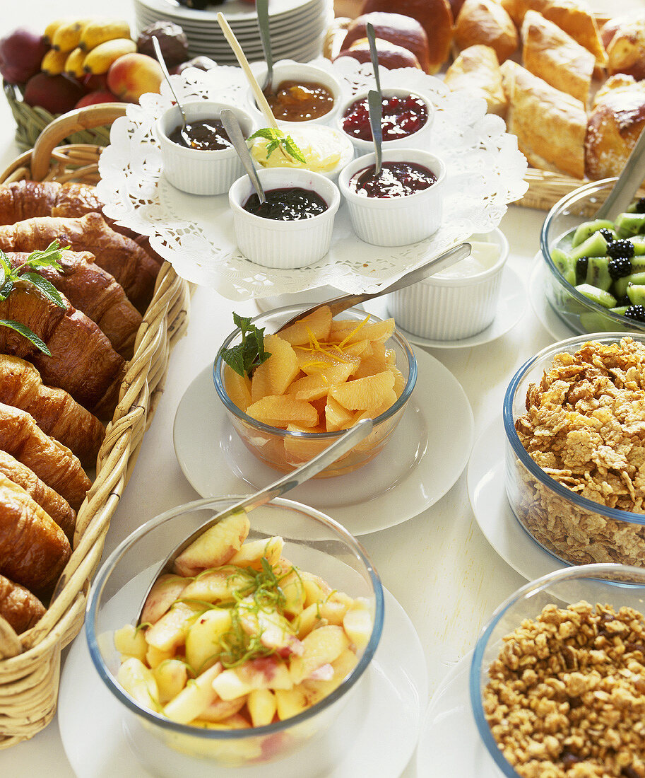 Breakfast buffet: muesli, fruit, jams, baked goods