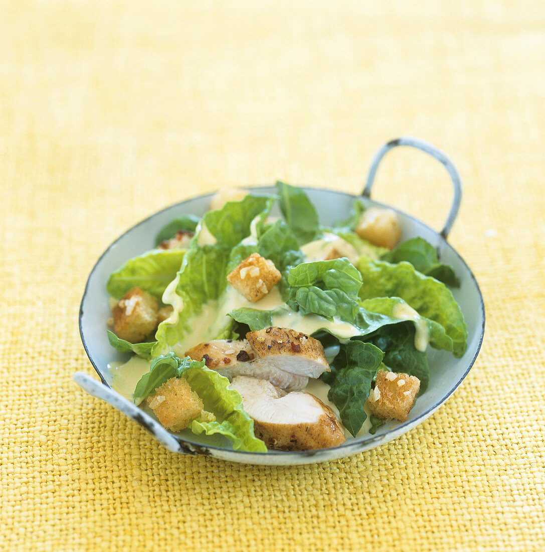 Caesar salad with chicken breast