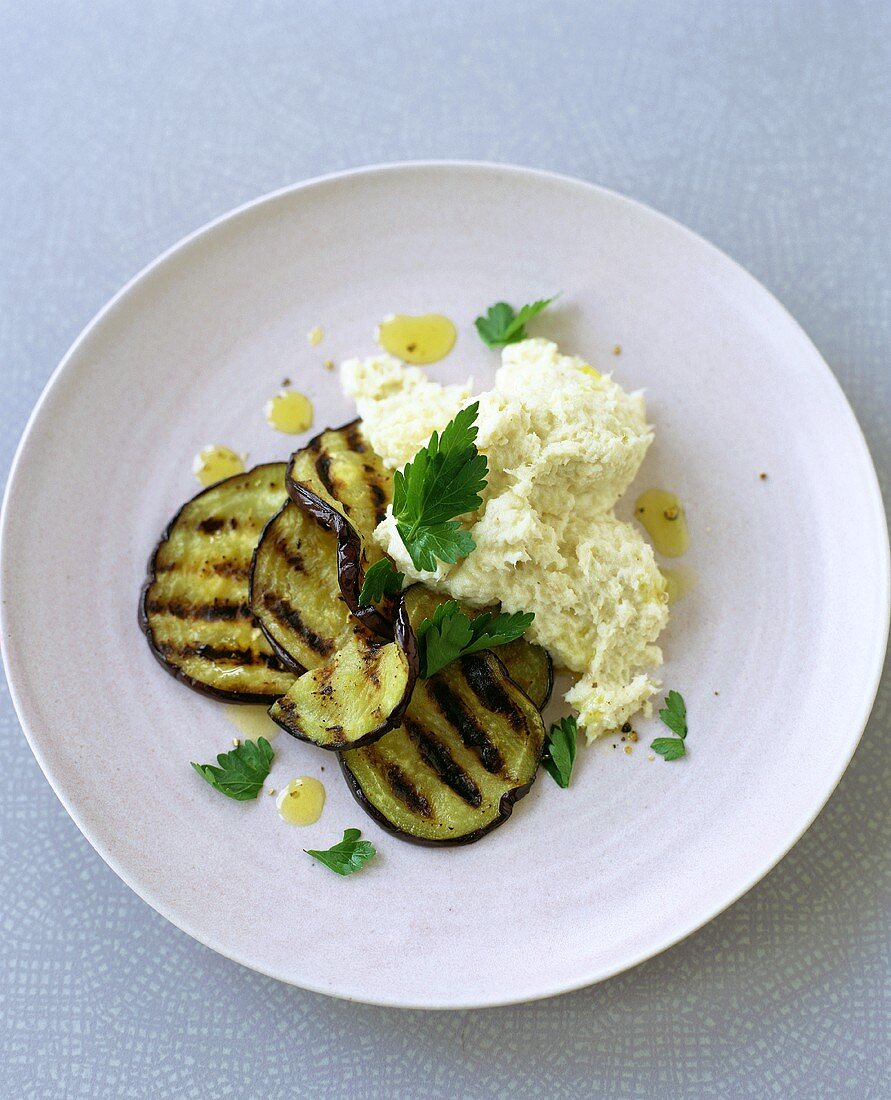 Grilled aubergine slices with haddock puree