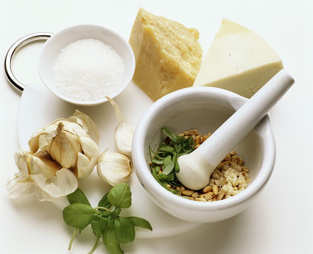 Still life with ingredients for basil pesto