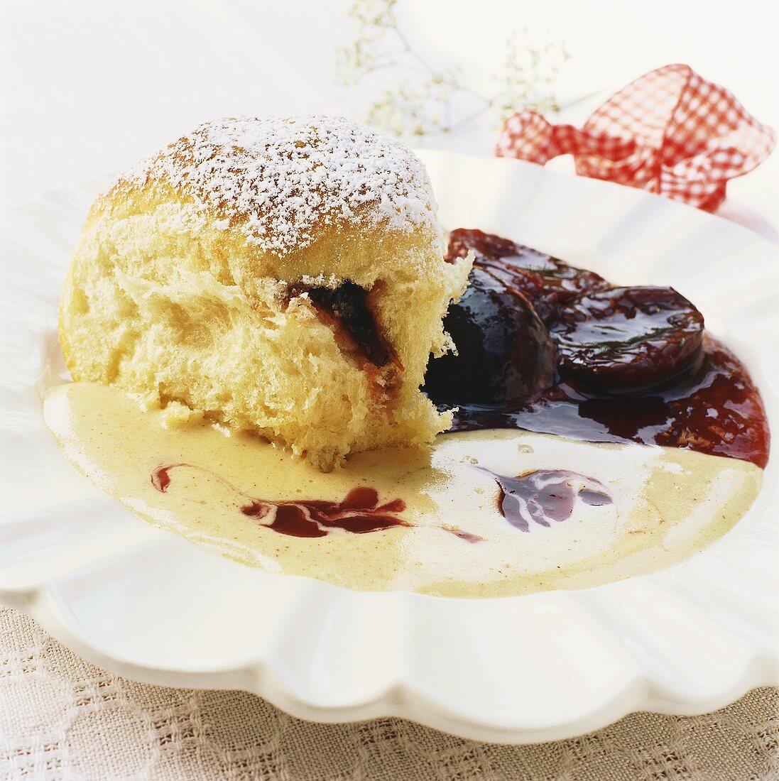 Filled yeast dumplings (Buchteln) with plum compote