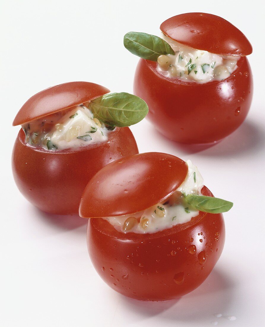 Three stuffed tomatoes