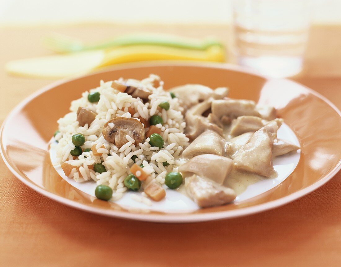 Chicken fricassée with vegetable rice