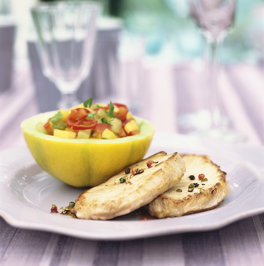 Pork loin chops with melon salad