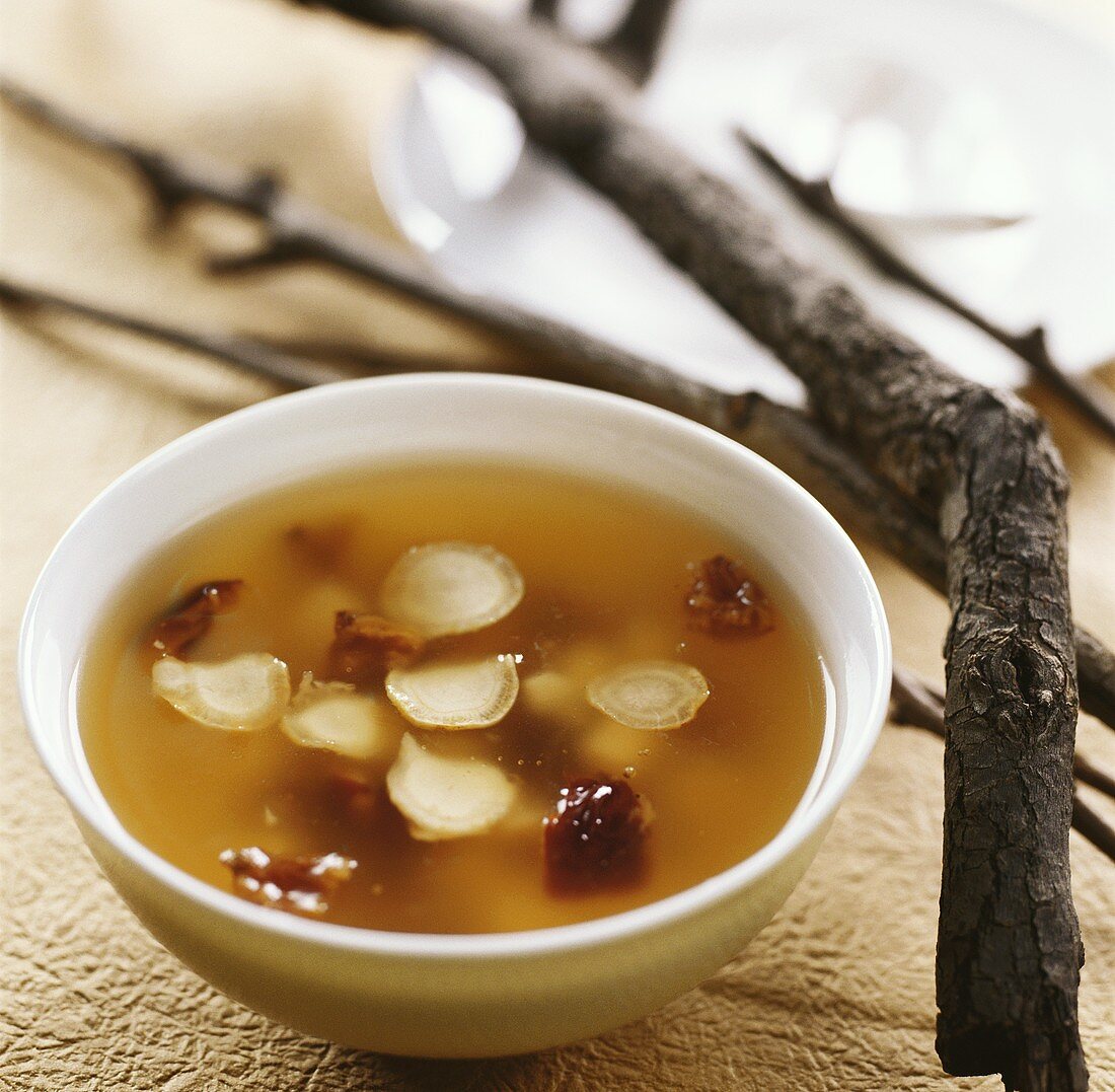 Raw fish soup with ginseng and dates