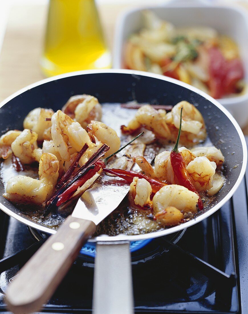 Prawns fried in spiced butter