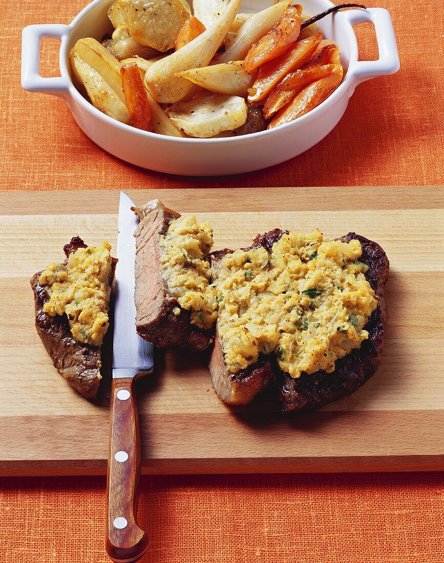 Two fried entrecôte steaks with onion crust