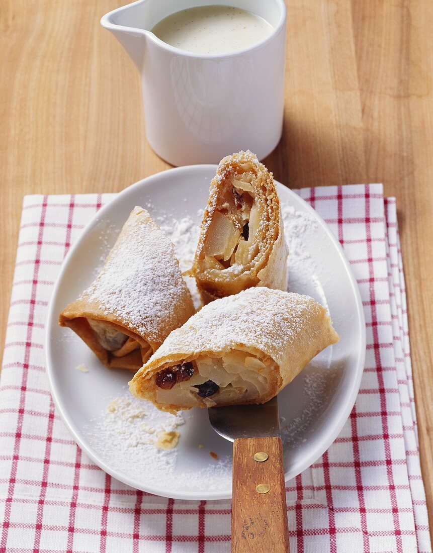 Pear and apple strudel with raisins and almonds