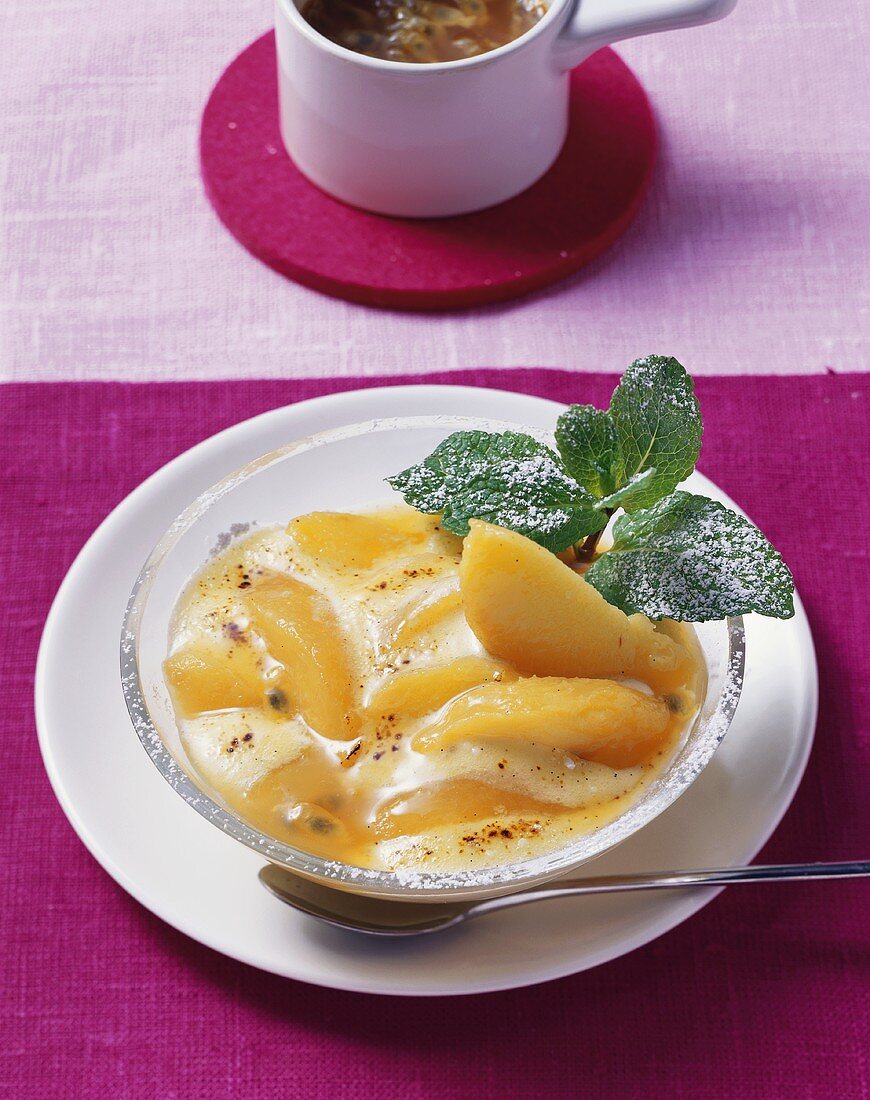 Poached peach with Grappa sabayon and passion fruit sauce