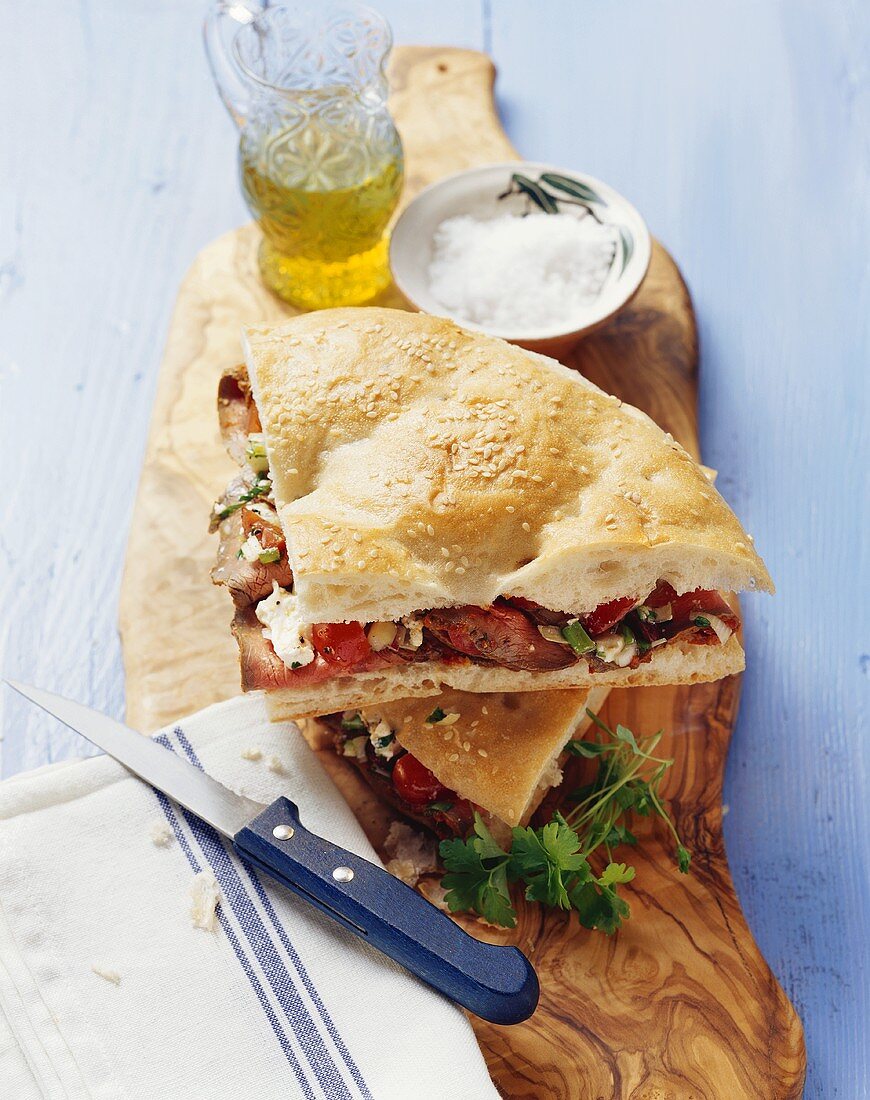 Beef, vegetable and feta cheese in flatbread