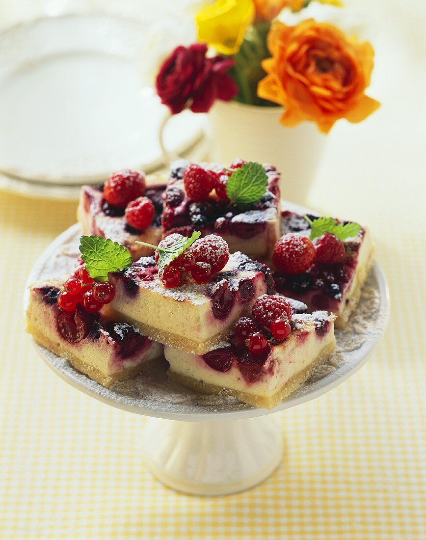 Berry cheesecake on cake stand