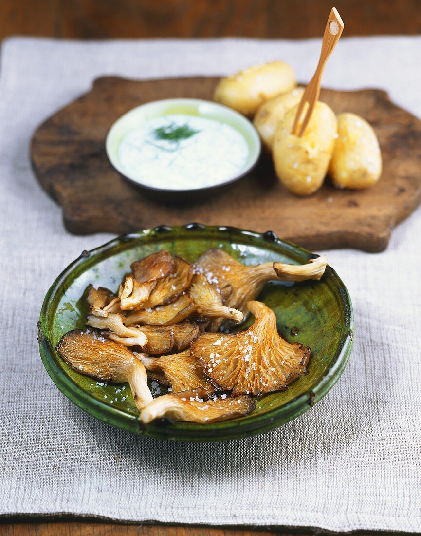 Grilled oyster mushrooms with boiled potatoes & herb sauce