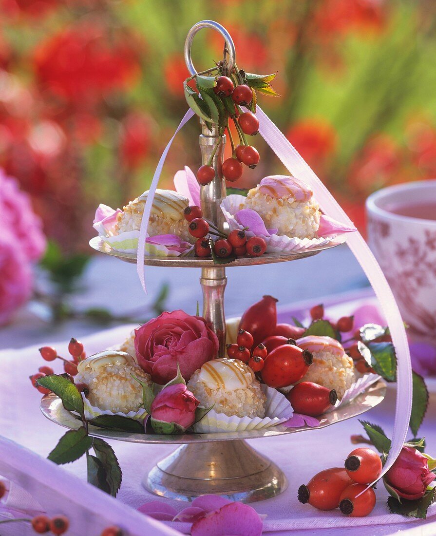 Sweets and roses on tiered silver stand