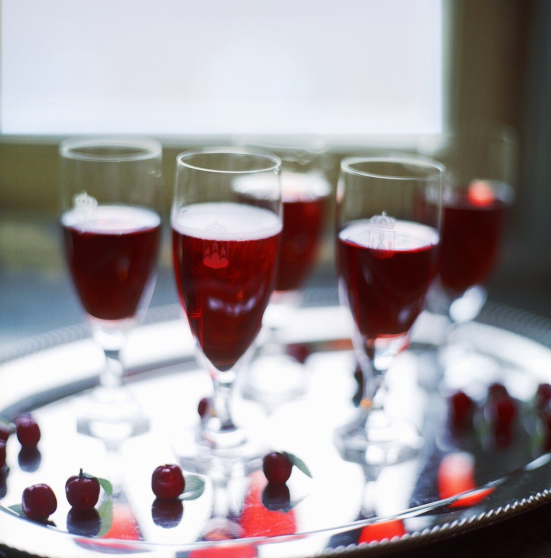 Kir royal in glasses on silver tray