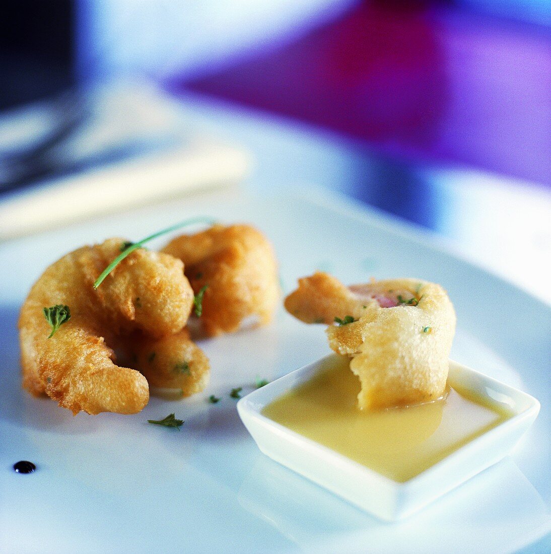 Deep-fried prawns in batter with sweet & sour pineapple sauce