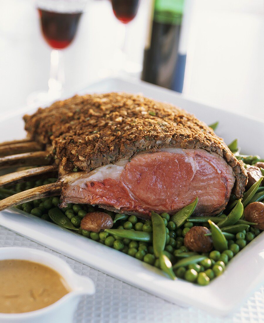 Rack of veal with chestnut crust on peas