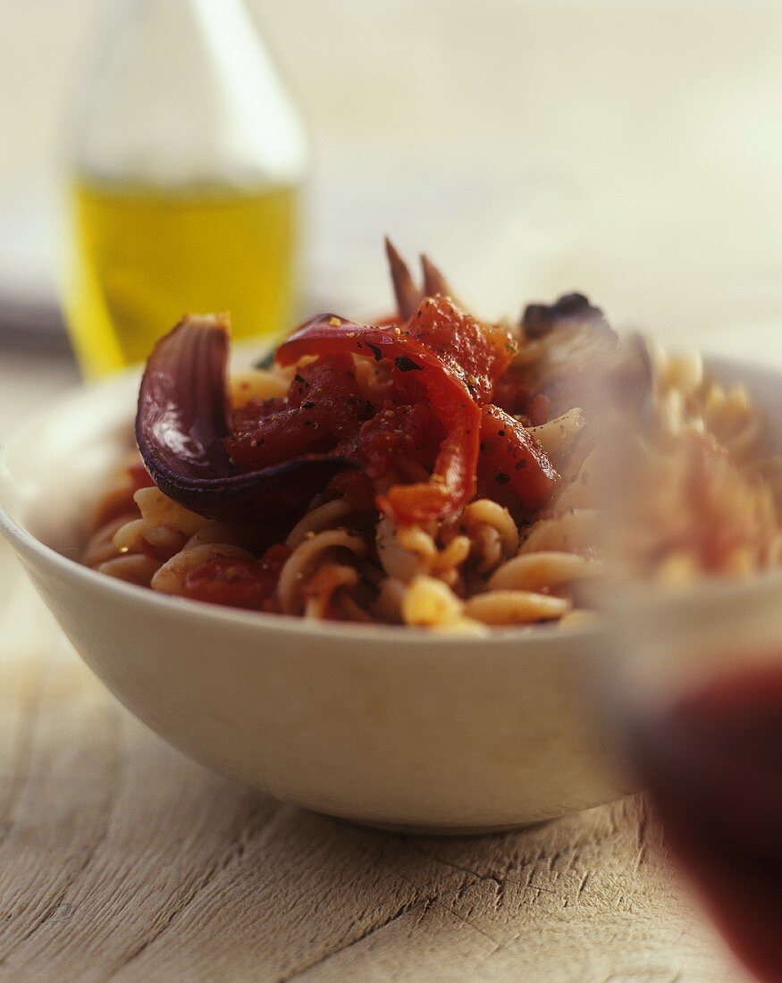 Fusilli with tomatoes and red onions