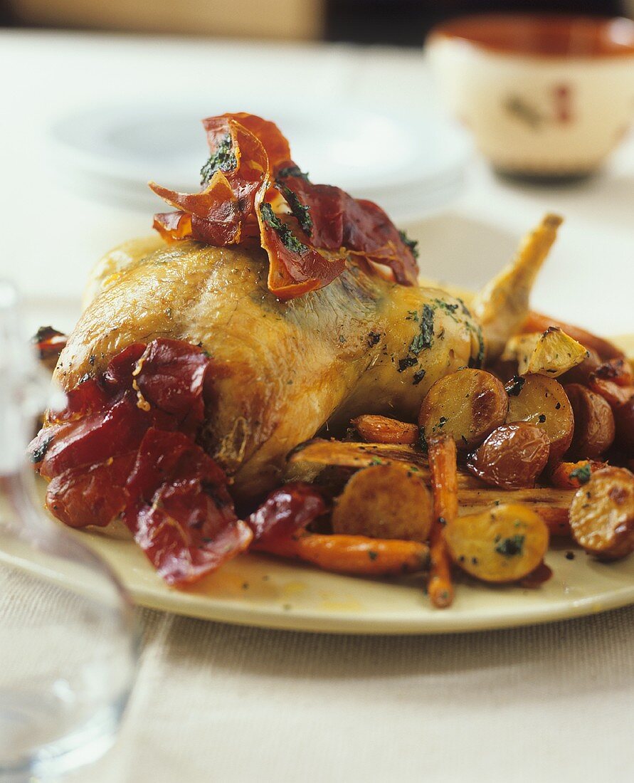 Roast chicken with bacon and roast potatoes