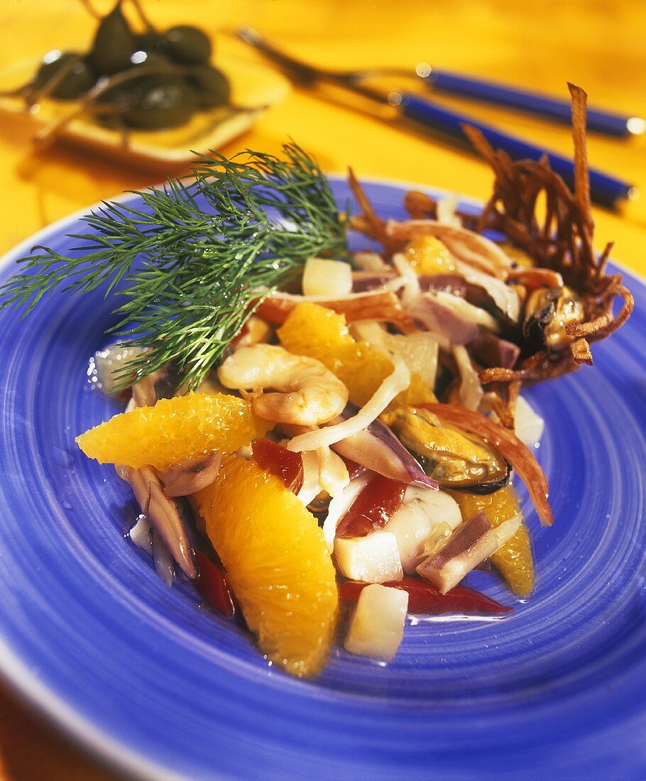 Seafood salad with orange segments