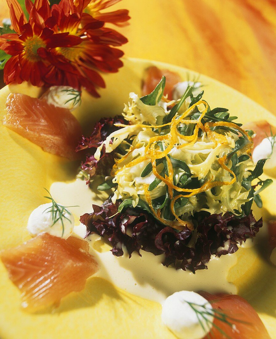 Salad leaves with orange sauce, soft cheese & smoked salmon