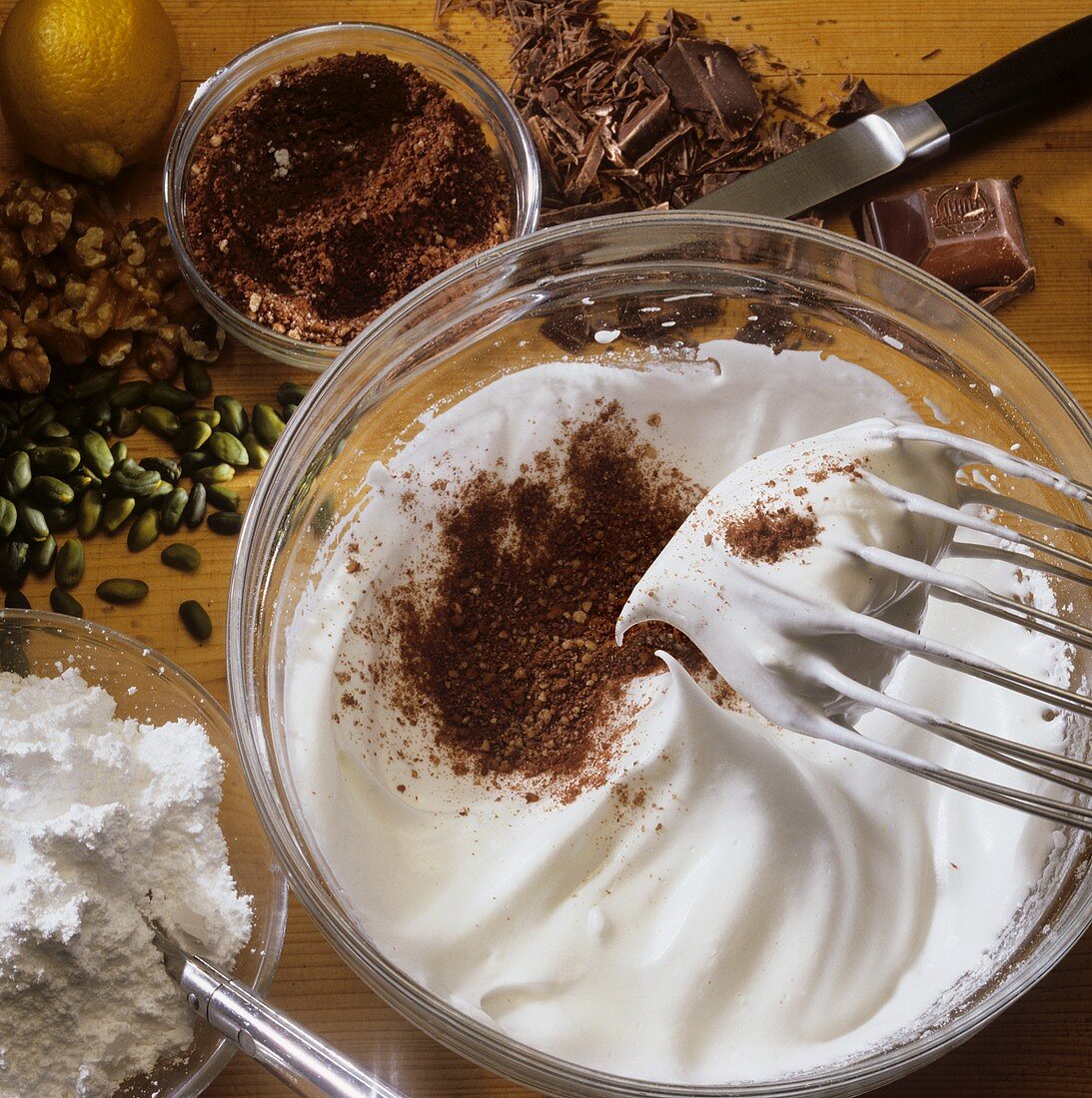 Making chocolate meringue or chocolate macaroons