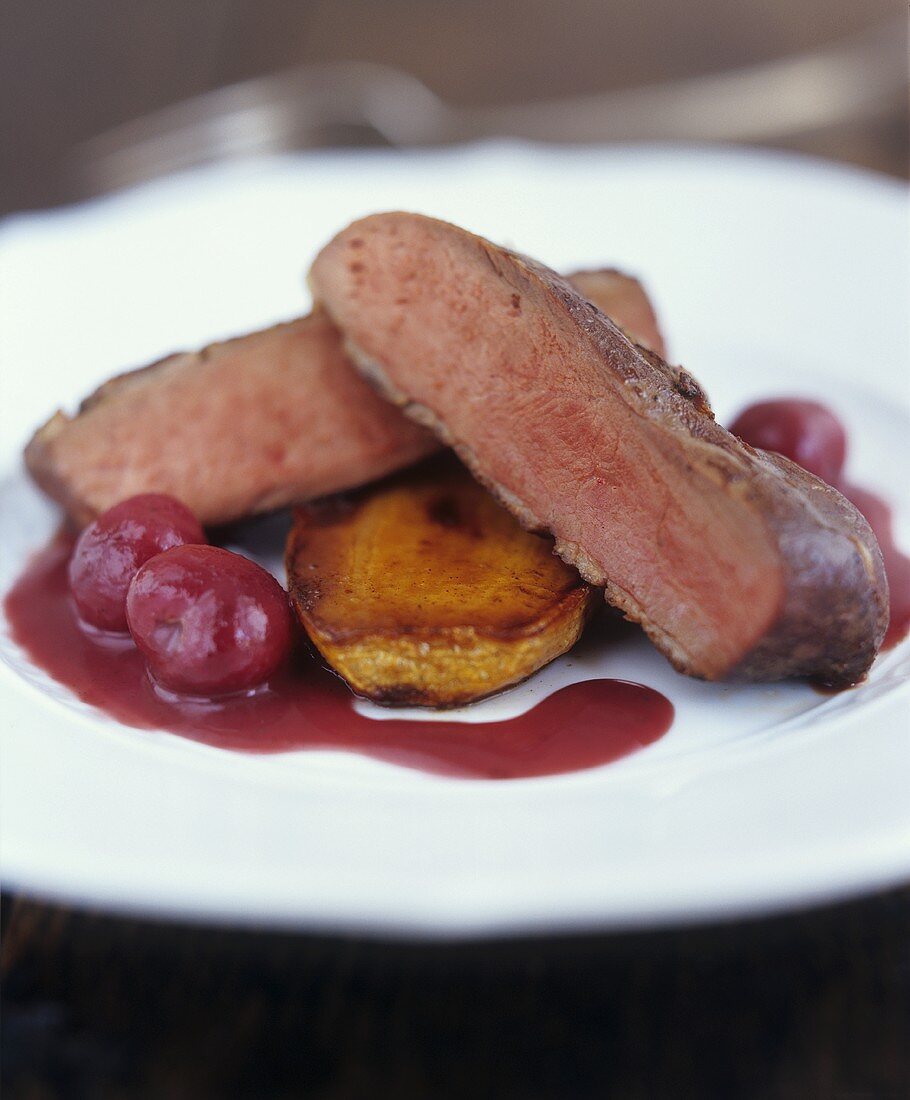 Fried duck breast with cherries (France)