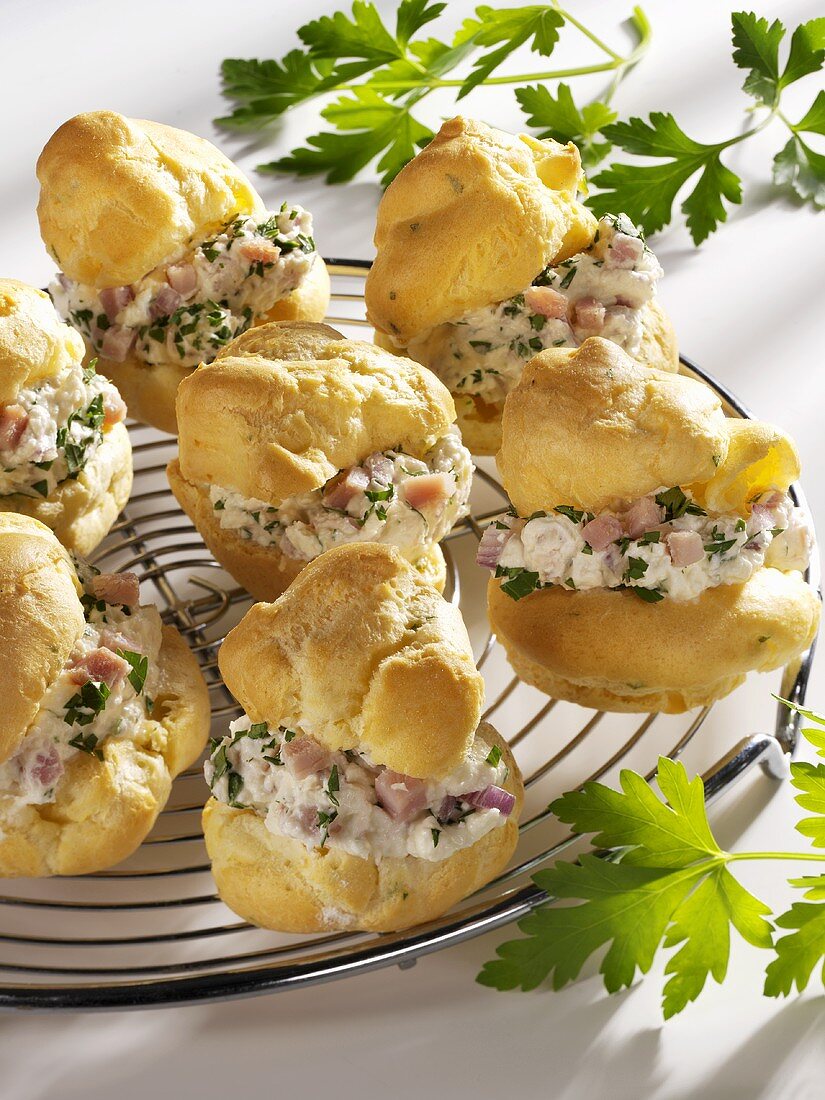 Savoury profiteroles with soft cheese and ham filling