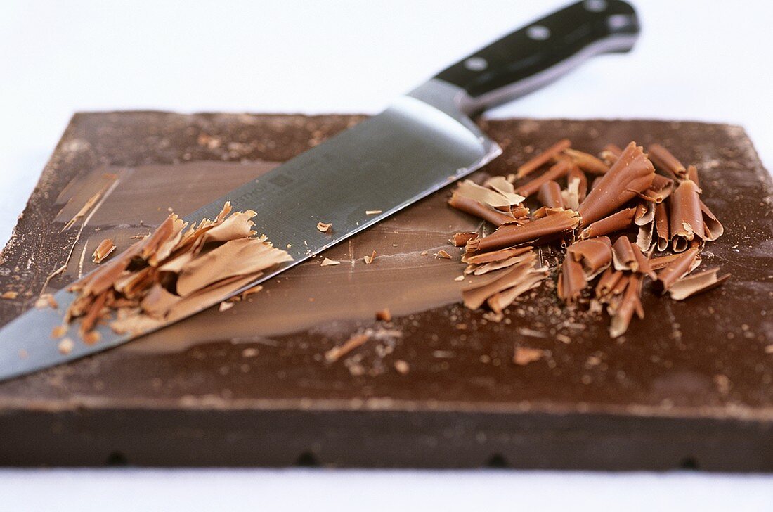 Chocolate shavings scraped from a bar of chocolate