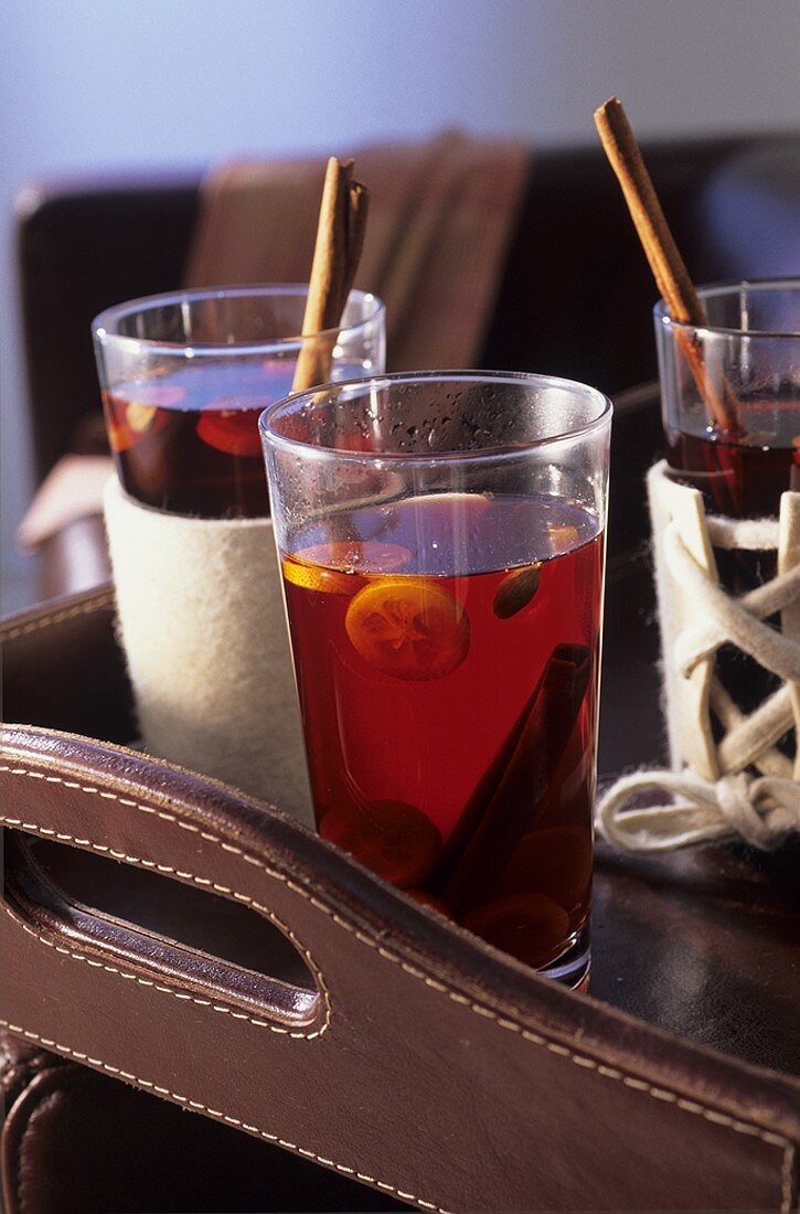 Red wine-tea punch with kumquats