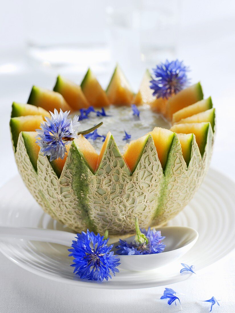 Spicy melon soup with cornflowers