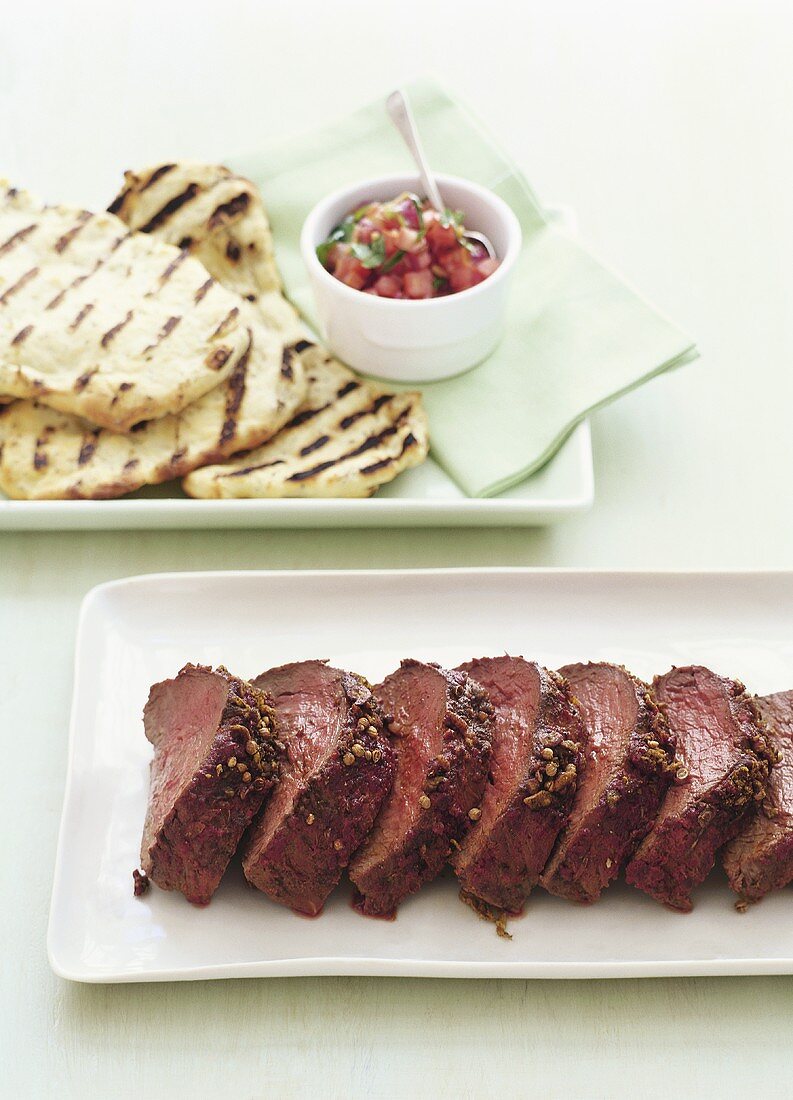 Beef fillet with spice crust, flatbread & tomato salsa