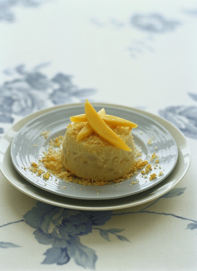 Coconut ice cream with caramel and mango