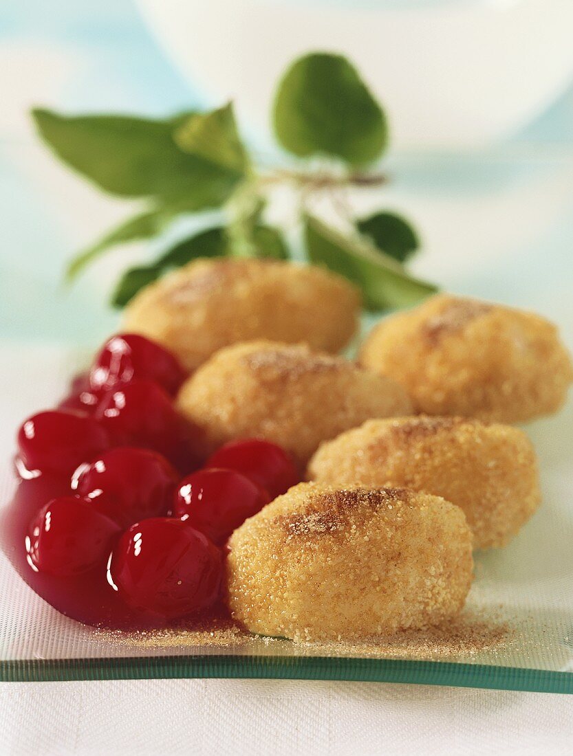 Semolina dumplings with cherries
