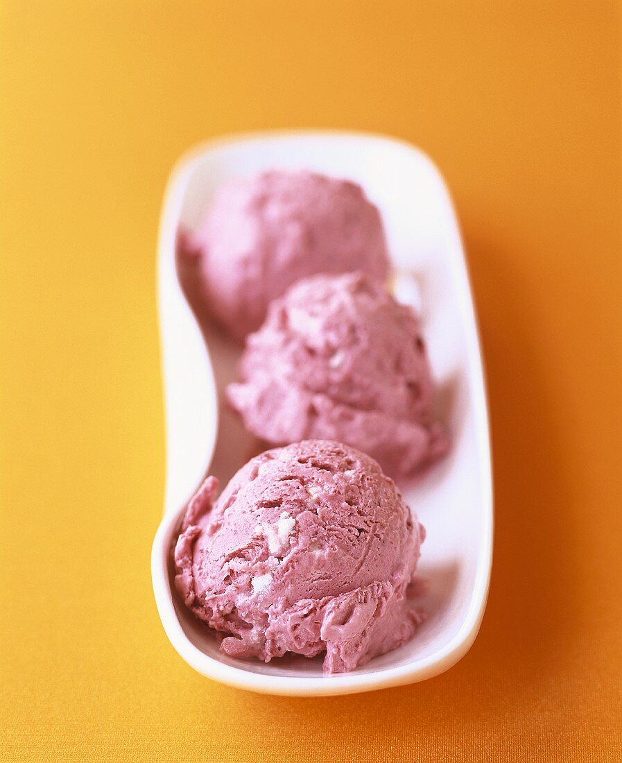 Three scoops of blackcurrant meringue ice cream