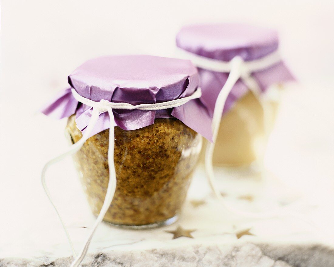 Two jars of mustard to give as a gift