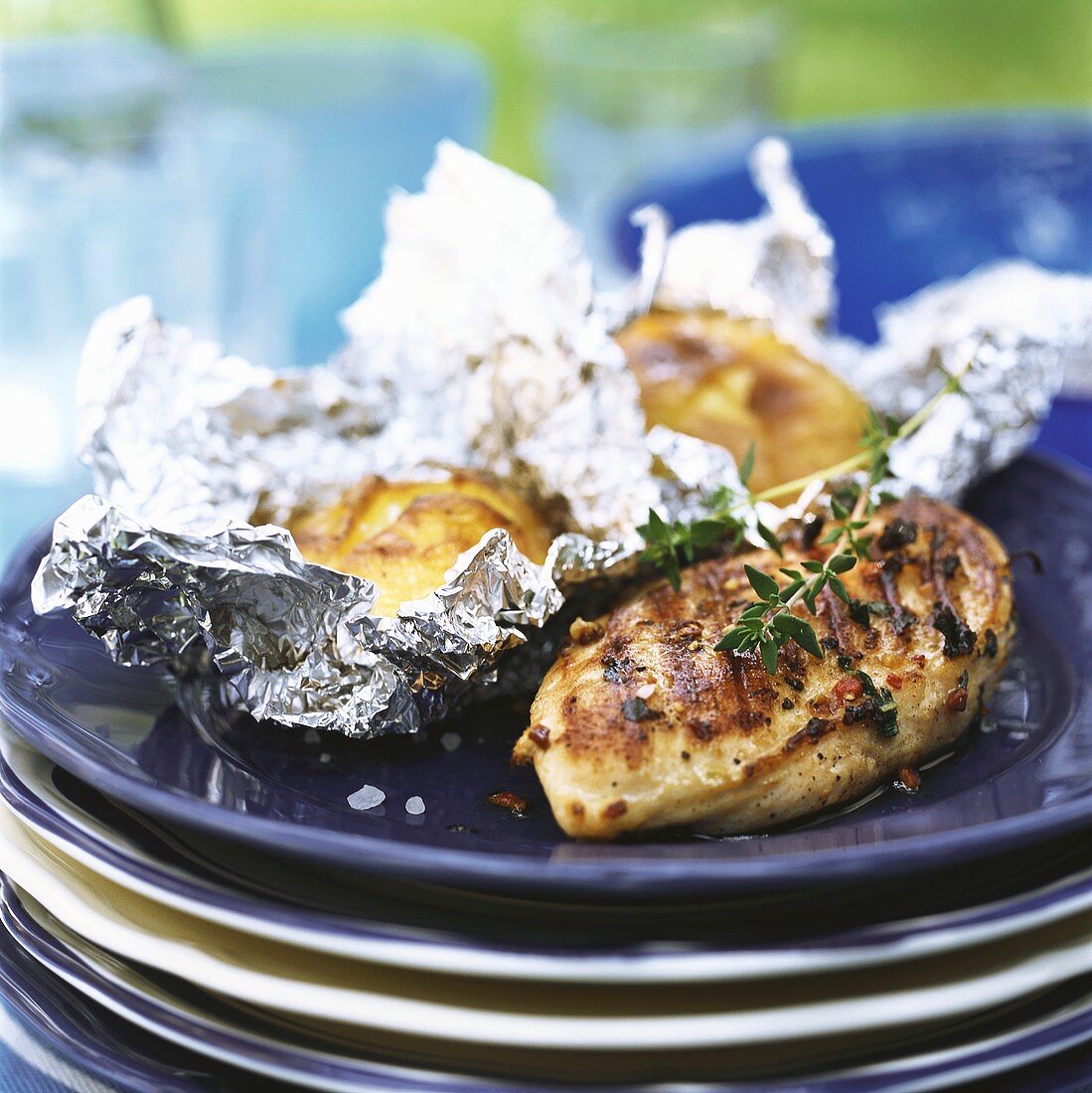 Grilled chicken with baked potatoes