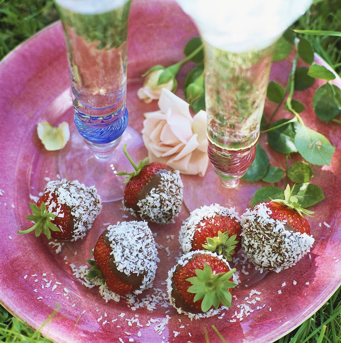 Strawberries dipped in chocolate & coconut, champagne