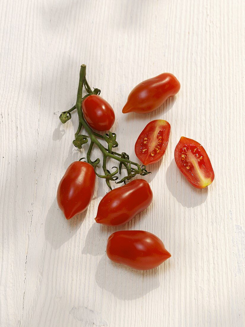 Several plum tomatoes