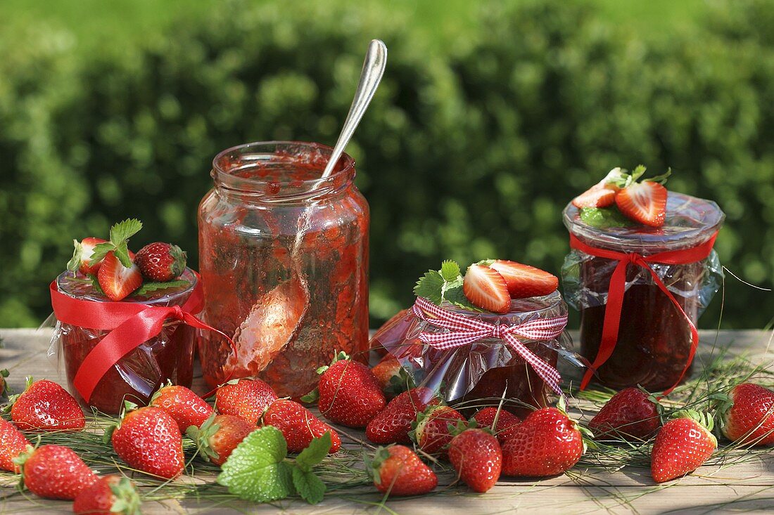Still life with strawberry jam and fresh strawberries