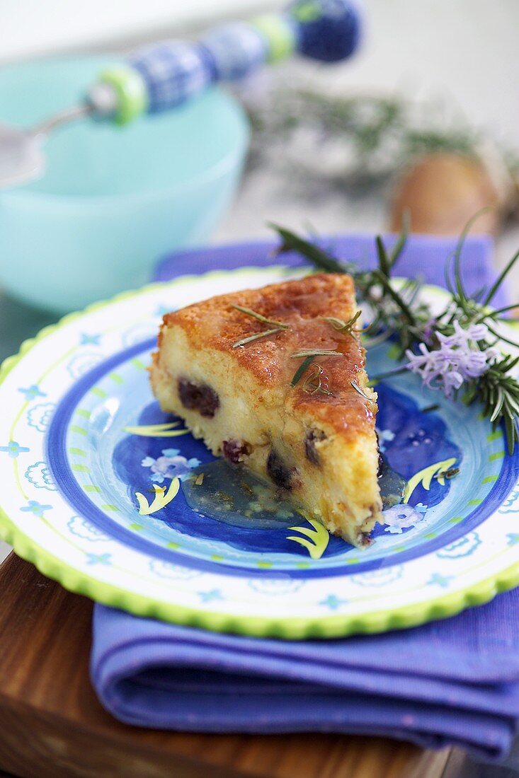 Ricotta cake with dried fruit and rosemary syrup