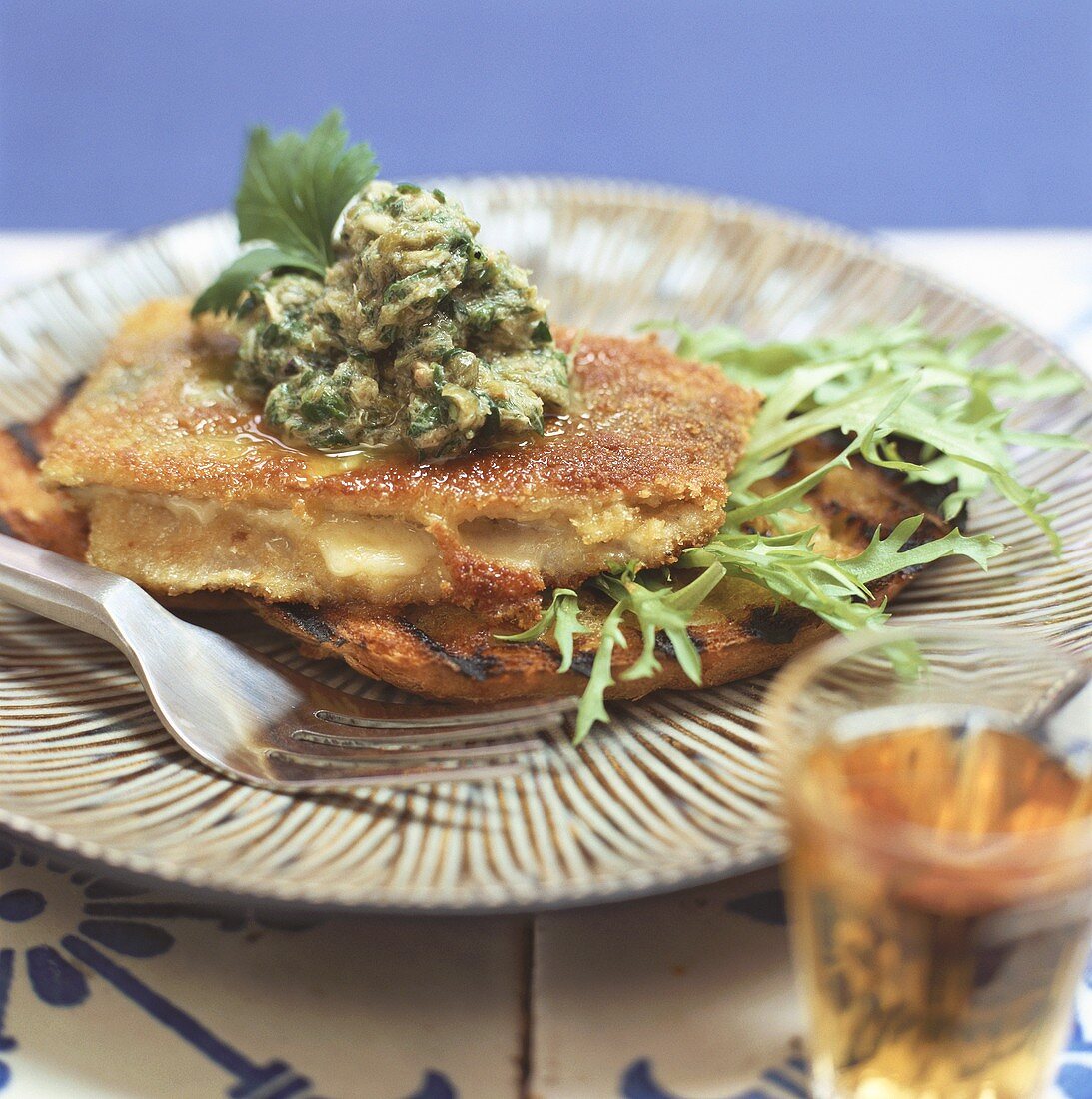 Toasted bread with stuffed herring and salsa