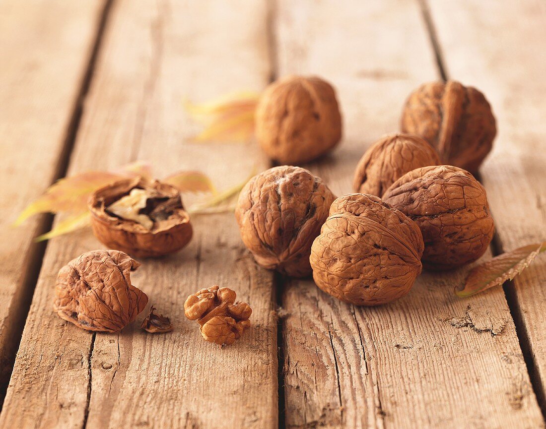 Walnuts on a wooden background