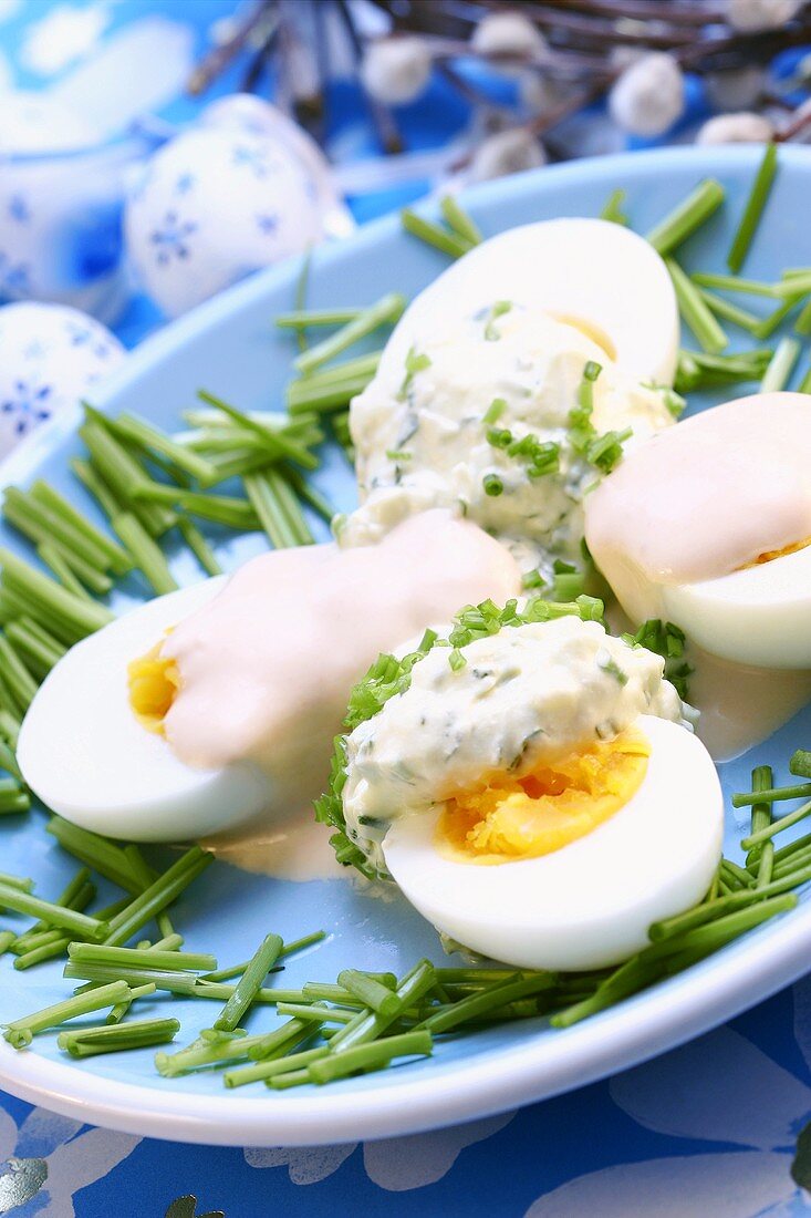 Boiled eggs with chives and mayonnaise