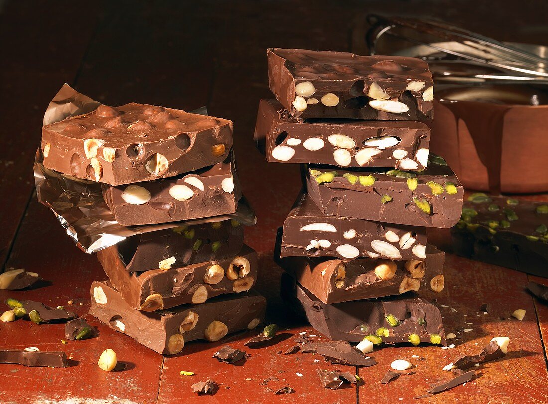Several bars of nut chocolate, in a pile