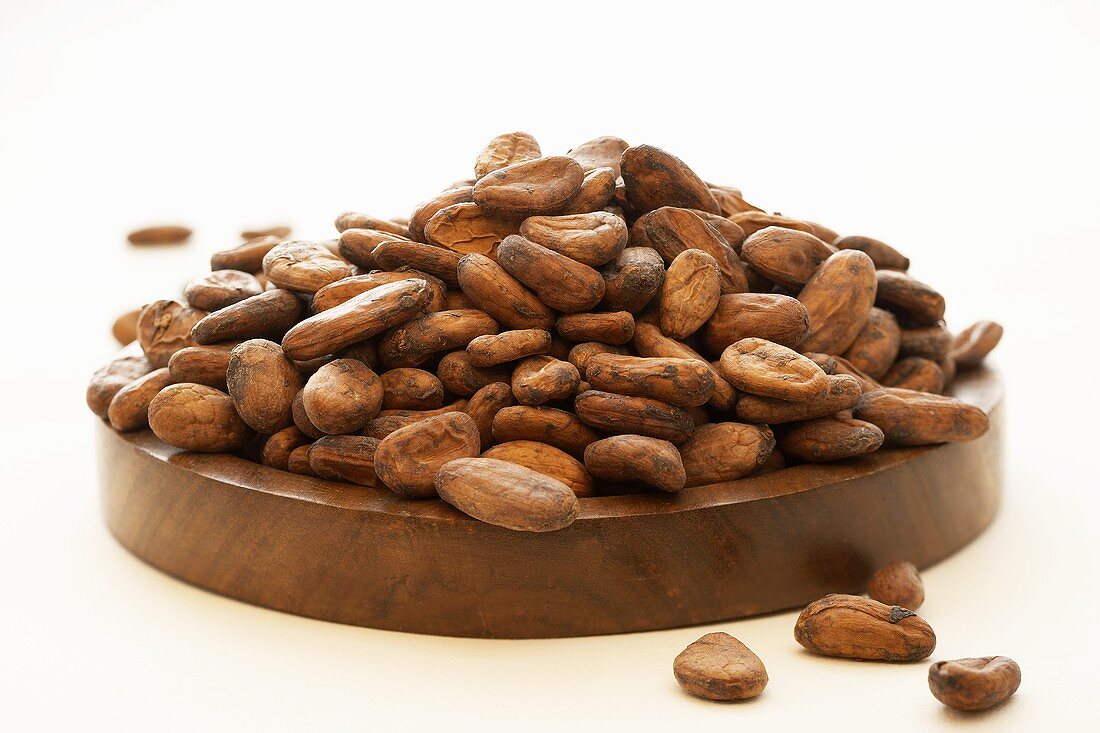 Cocoa beans on a wooden board