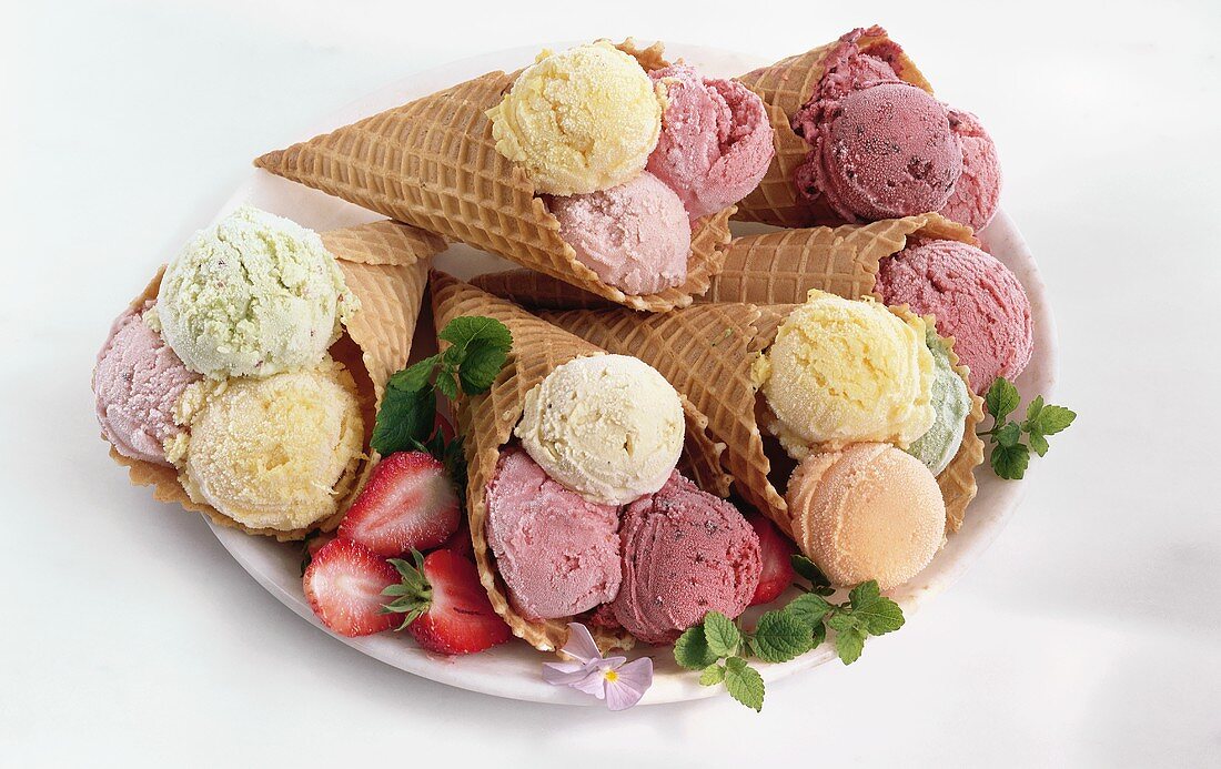 6 ice cream cones with 3 scoops of ice cream on plate