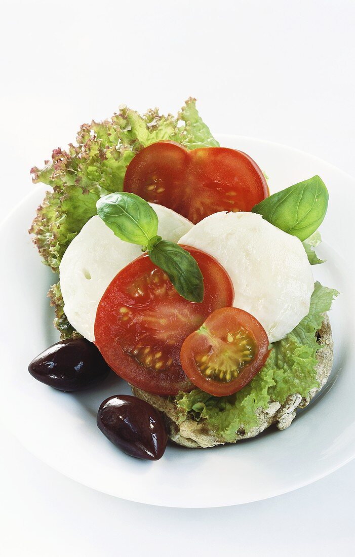 Ciabatta with tomatoes, mozzarella & olives