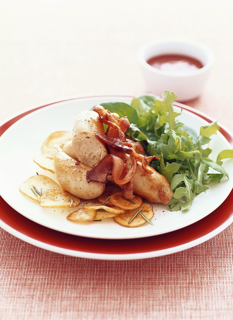 Pork sausages with bacon, potato crisps & rocket