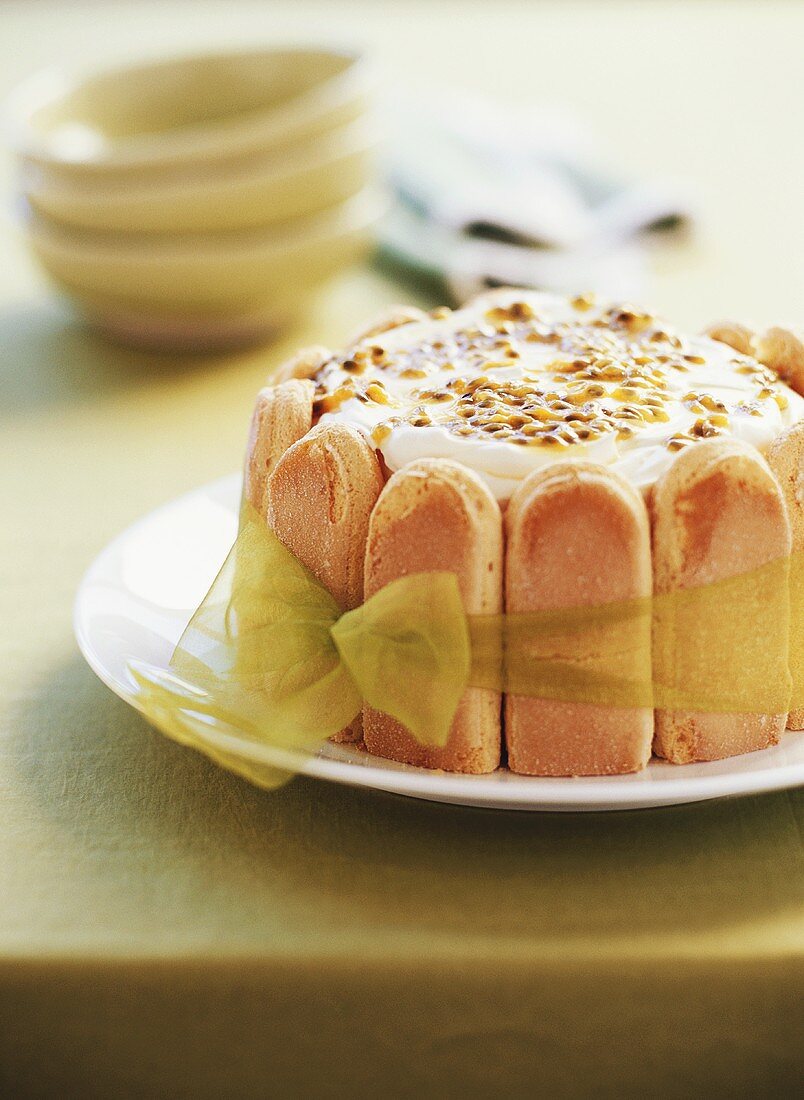 Passion fruit cake with sponge fingers