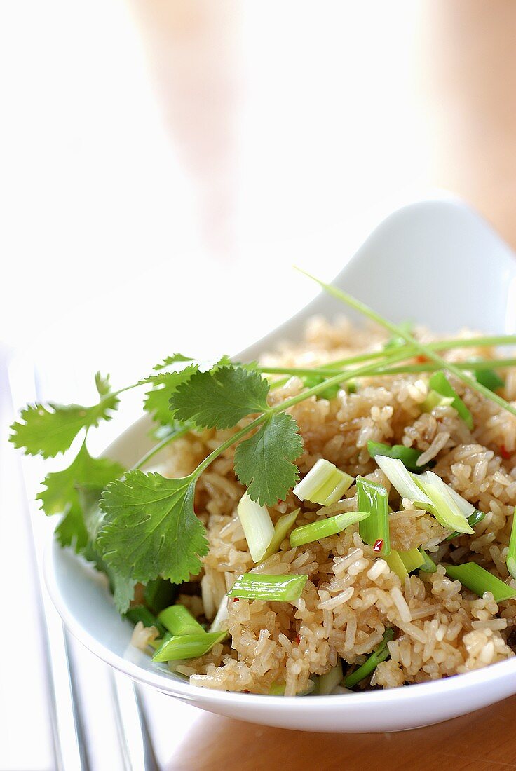 Sweet and sour rice with spring onions
